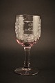 Old 
commemorative 
glass from 
Holmegaard 
glassworks with 
fine engraved 
floral 
decorations and 
...