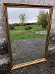 Mirror in 
painted wooden 
frame. 97x68 
cm.