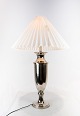 Tall table lamp 
in chrome from 
the 1980s and 
in great 
vintage 
condition. The 
shade is ...