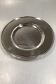 A Michelsen 
Sterling Silver 
Plate/Charger 
Measures 28 cm 
Diam 28.5 cm(11 
1/32 in)Weight 
448gr / ...
