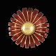 A. Michelsen. 
Gilded Silver 
Daisy Brooch / 
Pendant with 
rød Enamel. 
50mm
Crafted by A. 
...
