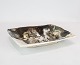 Ceramic dish in 
dark and light 
colors by Jeppe 
Hagedorn Olsen. 
The dish is in 
great vintage 
...