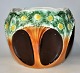 Majolica 
flowerpot 1880 
- 1900. 
Germany. Brown, 
green and 
yellow 
decorated with 
flowers. ...