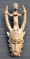 African mask in carved wood, approx. 1960. L. 49 cm. W .: 20 cm.