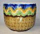 Majolica 
flowerpot 1880 
- 1900. 
Germany. 
Yellow, green, 
blue decorated 
with patterns 
and ...