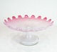 Centre piece of 
pink opaline 
glass from 
around the 
1860s.  
13 x 26.5 cm.