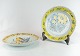 Two Kelling 
Husen plates 
decorated in 
yellow colours 
and with 
different 
motives of 
German ...