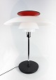 PH80 table lamp 
designed by 
Poul Henningsen 
and 
manufactured 
Louis Poulsen. 
The lamp was 
...