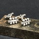 Length 2 cm.
Hallmarked 
Sterling, 
Denmark, 61B, 
Georg Jensen.
They are 
marked from the 
...