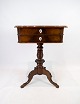 Side table of 
handpolished 
mahogany 
decorated with 
mother of pearl 
from around 
1860. The table 
...