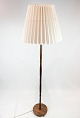 Floor lamp in rosewood of danish design from the 1960s. The shade is hand painted and hand ...