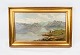 Oil painting 
with nature 
motif and 
gilded frame.
73 x 47,5 cm.
