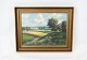 Oil painting 
with nature 
motif and 
gilded frame by 
Carl Leo 
Frømming.
50 x 40,5 cm.