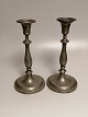 A pair of pewter rods with loose cuffs Sweden about 1840-1850 Height 27cm Diameter foot 13cm.