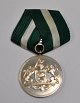 Danish Police Merit Medal, 20th Century Silver with ribbon. In original box.