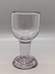 Wine glass on 
hollow smooth 
stem and bent 
foot 
Conradsminde 
1840-1850Height 
11.4cm.
