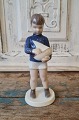 B&G Figure - 
Boy with 
sailing ship 
No. 2380, 
Factory first. 
Height 18 cm. 
Design: Claire 
...