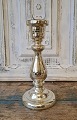 1800s 
candlestick in 
mercuri silver. 

Height 22 cm.