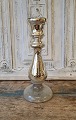 1800s 
candlestick in 
mercuri silver. 

Appears with 
beautiful 
patina. 
Height 28 cm.