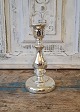 1800s 
candlestick in 
mercuri silver. 

Height 17.5 
cm.