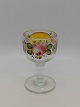 Enamel 
decorated wine 
glass with 
devisefelt ca. 
From 1860 
Height 10.8cm.