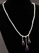N E From 
sterling silver 
necklace 42 cm. 
with three 
amethysts No. 
442463