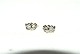 Elegant 
earrings with 
stones in 14 
carat gold
Stamped 585
Height 13.35 
mm
Width 9.53 mm
The ...