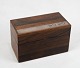 Box in rosewood 
decorated with 
horse 
carriages, in 
great used 
condition. 
H - 7 cm, W - 
11 cm ...