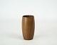 Small vase in 
teak of danish 
design from the 
1960s.
9 x 4 cm.