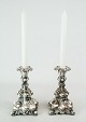 A pair of new 
Rococo silvered 
 candlesticks 
from the 1930s. 
The pair is  in 
great antique 
...