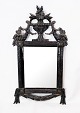 Rococo mirror 
with black 
painted wooden 
frame with 
carvings, in 
great antique 
condition from 
the ...