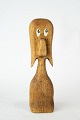 Figure with 
eyes in teak 
from the 1970s 
and in great 
used condition.
19 cm.