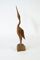 Figure in the 
shape of a bird 
and of 
rosewood.
21.5 cm.