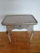 Rococo tile table with extension for candlesticks Curved legs decorated with bluish flowers ...