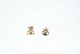 Elegant 
earrings in 14 
carat gold
Stamped 585
Height 7.92 mm
Width 7.92 mm
Checked by ...