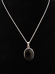 Silver necklace 
43 cm. with 
pendant 1.8 x 
2.5 cm. 
carnelian 
mounted in 
sterling silver 
Nr. 443728