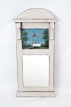 Small grey 
painted 
gustavian 
mirror from 
1810. The 
mirror is 
decorated with 
a small 
painting.
H ...