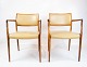 A few N.O. 
Møller 
armchairs, 
model 65, in 
rosewood and 
light leather, 
manufactured by 
J.L. ...