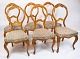Set of six 
Rococo dining 
room chairs of 
light mahogany 
and fabric with 
pattern from 
around the ...