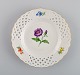 Meissen plate 
in openwork 
porcelain with 
hand-painted 
flowers and 
gold 
decoration. 
20th ...