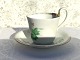Bing & 
Grondahl, 
High-handled 
cup with green 
flowers and 
gold edge # B & 
G, 8cm in 
diameter, 9cm 
...