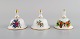Three Herend 
table bells in 
hand-painted 
porcelain with 
flowers and 
gold 
decoration. ...