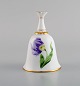 Herend table 
bell in 
hand-painted 
porcelain with 
flowers and 
gold 
decoration. 
1980s.
Measures: ...