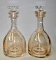 A pair of 
crystal 
decanters with 
grindings, 20th 
century H .: 24 
cm.
NB: Very nice 
condition! ...