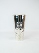 Vase decorated 
with a rose of 
hallmarked 
silver.
19 x 11 cm.