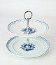 Two part cake 
centerpiece in 
Aluminia, no.: 
11/2847-2855, 
by Royal 
Copenhagen.
H - 15.5 cm 
and ...