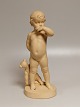Ipsen ceramic 
figure "In 
thoughts" child 
with teddy bear 
artist Adda 
Bonflis Height 
30cm.