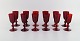 Monica Bratt 
for Reijmyre. 
Twelve liqueur 
glasses in red 
mouth blown art 
glass. ...
