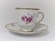 Bing & 
Grondahl. 
Hamlet. With 
purple colored 
flower and gold 
border. Coffee 
cup. There are 
10 ...