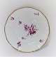 Bing & 
Grondahl. 
Hamlet. With 
purple colored 
flower and gold 
border. Cake 
plate. Diameter 
17.5 ...
